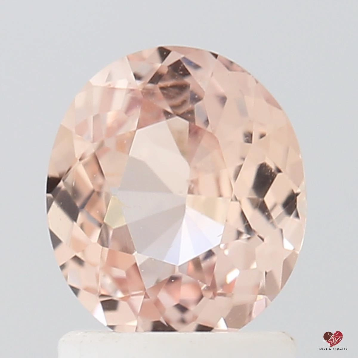 1.37cts Oval Medium Peach Blush Champagne Sapphire