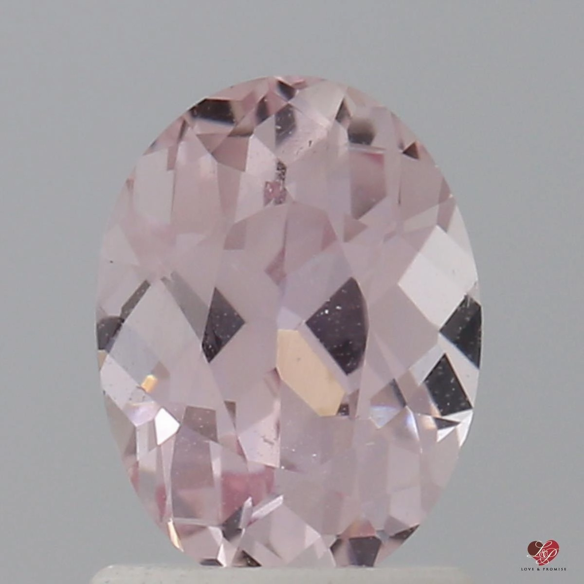 1.51cts Oval Light Blush Champagne Peach Sapphire